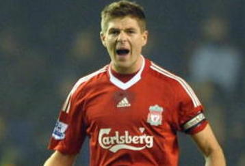 LIVERPOOL, ENGLAND - NOVEMBER 09:  Steven Gerrard of Liverpool celebrates scoring his team's second goal from the penalty spot during the Barclays Premier League match between Liverpool and Birmingham City at Anfield on November 9, 2009 in Liverpool, England.  (Photo by Laurence Griffiths/Getty Images)