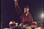 1 Jan 1996:  Head coach Bobby Bowden of the Florida State Seminoles is carried triumphantly off the field by nose guard Andre Wadsworth #8 and tackle Orpheus Roy after defeating the Notre Dame Fighting Irish in the Orange Bowl in Miami, Florida 31-26.  Ma