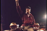 1 Jan 1996:  Head coach Bobby Bowden of the Florida State Seminoles is carried triumphantly off the field by nose guard Andre Wadsworth #8 and tackle Orpheus Roy after defeating the Notre Dame Fighting Irish in the Orange Bowl in Miami, Florida 31-26.  Ma