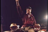 1 Jan 1996:  Head coach Bobby Bowden of the Florida State Seminoles is carried triumphantly off the field by nose guard Andre Wadsworth #8 and tackle Orpheus Roy after defeating the Notre Dame Fighting Irish in the Orange Bowl in Miami, Florida 31-26.  Ma
