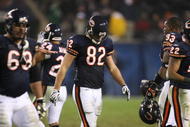 CHICAGO - NOVEMBER 22: Greg Olsen #82 of the Chicago Bears walks off the field with teammates at the end of the Bears' last offensive series against the Philadelphia Eagles at Soldier Field on November 22, 2009 in Chicago, Illinois. The Eagles defeated the Bears 24-20. (Photo by Jonathan Daniel/Getty Images)