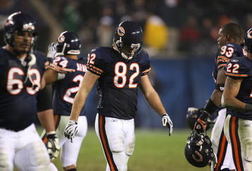 CHICAGO - NOVEMBER 22: Greg Olsen #82 of the Chicago Bears walks off the field with teammates at the end of the Bears' last offensive series against the Philadelphia Eagles at Soldier Field on November 22, 2009 in Chicago, Illinois. The Eagles defeated the Bears 24-20. (Photo by Jonathan Daniel/Getty Images)