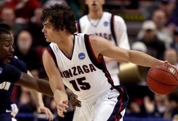 PORTLAND, OR - MARCH 19:  Matt Bouldin #15 of the Gonzaga Bulldogs drives on Darryl Roberts #12 of the Akron Zips in the second half during the first round of the NCAA Division I Men's Basketball Tournament at the Rose Garden on March 19, 2009 in Portland, Oregon.  (Photo by Jonathan Ferrey/Getty Images)