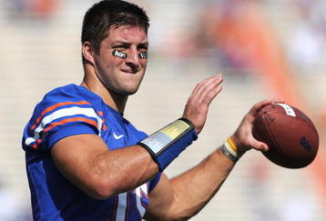 GAINESVILLE, FL - NOVEMBER 21: Quarterback Tim Tebow #15 of the Florida Gators warms up for play against the Florida International University Golden Panthers November 21, 2009 at Ben Hill Griffin Stadium in Gainesville, Florida.  (Photo by Al Messerschmidt/Getty Images)