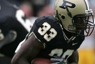 WEST LAFAYETTE, IN - SEPTEMBER 23:  Jaycen Taylor #33 of the Purdue Boilermakers rushes the ball against the Minnesota Golden Gophers during a Big Ten Conference game September 23, 2006 at Ross-Ade Stadium in West Lafayette, Indiana. Purdue won 27-21. (Photo by Andy Lyons/Getty Images)