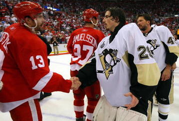 DETROIT - JUNE 12: Marc-Andre Fleury #29 of the Pittsburgh Penguins shakes hands with Pavel Datsyuk #13 of the Detroit Red Wings after Game Seven of the 2009 NHL Stanley Cup Finals at Joe Louis Arena on June 12, 2009 in Detroit, Michigan. (Photo by Jim McIsaac/Getty Images) 