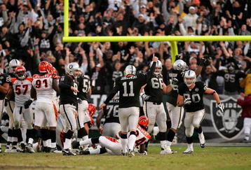OAKLAND, CA - NOVEMBER 22:  Sebastian Janikowski #11 of the Oakland Raiders celebrates after he kicked the winning field goal with less than a minute to play against the Cincinnati Bengals at Oakland-Alameda County Coliseum on November 22, 2009 in Oakland, California.  (Photo by Ezra Shaw/Getty Images)