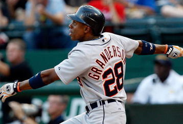 ARLINGTON, TX - JULY 29:  Center fielder Curtis Granderson #28 of the Detroit Tigers hits his second home run of the game in the second inning against the Texas Rangers on July 29, 2009 at Rangers Ballpark in Arlington, Texas.  (Photo by Ronald Martinez/Getty Images)