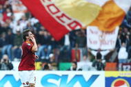 ROME - NOVEMBER 22:  Francesco Totti of AS Roma celebrates the third goal during the Serie A match between Roma and Bari at Stadio Olimpico on November 22, 2009 in Rome, Italy.  (Photo by Paolo Bruno/Getty Images)