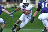 EVANSTON, IL - OCTOBER 31: Evan Royster #22 of the Penn State Nittany Lions runs against the Northwestern Wildcats at Ryan Field on October 31, 2009 in Evanston, Illinois. (Photo by Jonathan Daniel/Getty Images)