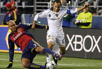 SEATTLE - NOVEMBER 22:  Robbie Russell #3 of Real Salt Lake challenges Landon Donovan #10 of Los Angeles Galaxy during the MLS Cup final at Qwest Field on November 22, 2009 in Seattle, Washington.  (Photo by Otto Greule Jr/Getty Images)