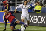 SEATTLE - NOVEMBER 22:  Robbie Russell #3 of Real Salt Lake challenges Landon Donovan #10 of Los Angeles Galaxy during the MLS Cup final at Qwest Field on November 22, 2009 in Seattle, Washington.  (Photo by Otto Greule Jr/Getty Images)