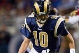 ST. LOUIS - NOVEMBER 22: Marc Bulger #10 of the St. Louis Rams fumbles the ball against the Arizona Cardinals at the Edward Jones Dome on November 22, 2009 in St. Louis, Missouri.  The Cardinals beat the Rams 21-13.  (Photo by Dilip Vishwanat/Getty Images)