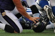 BALTIMORE - NOVEMBER 22:  Matt Birk #77 of the Baltimore Ravens collects his helmet after an unsuccessful goalline run against the Indianapolis Colts at M&T Bank Stadium on November 22, 2009 in Baltimore, Maryland. The Colts defeated the Ravens 17-15. (Photo by Larry French/Getty Images)