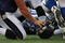 BALTIMORE - NOVEMBER 22:  Matt Birk #77 of the Baltimore Ravens collects his helmet after an unsuccessful goalline run against the Indianapolis Colts at M&T Bank Stadium on November 22, 2009 in Baltimore, Maryland. The Colts defeated the Ravens 17-15. (Photo by Larry French/Getty Images)