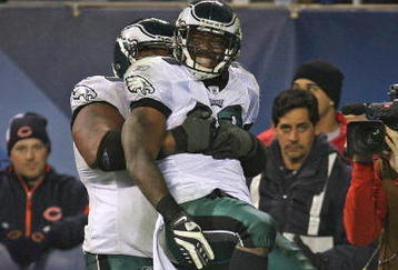 CHICAGO - NOVEMBER 22: LeSean McCoy #29 of the Philadelphia Eagles is lifted by teammate Nick Cole #59 after scoring the game-winning touchdown against the Chicago Bears at Soldier Field on November 22, 2009 in Chicago, Illinois. The Eagles defeated the Bears 24-20. (Photo by Jonathan Daniel/Getty Images)