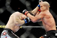 LAS VEGAS - NOVEMBER 21: Tito Ortiz (R) battles Forrest Griffin (L) during their Light Heavyweight Fight at the UFC 106 at Mandalay Bay Events Center on November 21, 2009 in Las Vegas, Nevada. (Photo by Jon Kopaloff/Getty Images)