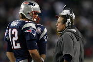 FOXBORO, MA - NOVEMBER 22:  Tom Brady #12 of the New England Patriots talks with head coach Bill Belichick in fourth quarter against the New York Jets on November 22, 2009 at Gillette Stadium in Foxboro, Massachusetts. The Patriots defeated the Jets 31-14.  (Photo by Elsa/Getty Images)