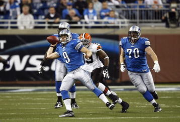 DETROIT, MI - NOVEMBER 22: Matthew Stafford #9 of the Detroit Lions passes the football while under pressure against the Cleveland Browns at Ford Field on November 22, 2009 in Detroit, Michigan. The Lions came from behind to defeat the Browns 38-37. (Photo by Joe Robbins/Getty Images)