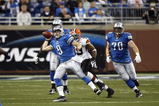 DETROIT, MI - NOVEMBER 22: Matthew Stafford #9 of the Detroit Lions passes the football while under pressure against the Cleveland Browns at Ford Field on November 22, 2009 in Detroit, Michigan. The Lions came from behind to defeat the Browns 38-37. (Photo by Joe Robbins/Getty Images)