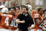 AUSTIN, TX - SEPTEMBER 5:  Defensive coordinator Will Muschamp of the Texas Longhorns gets pumped up after a turnover by the Louisiana Monroe Warhawks in the first quarter on September 5, 2009 at Darrell K Royal-Texas Memorial Stadium in Austin, Texas.  (Photo by Brian Bahr/Getty Images)