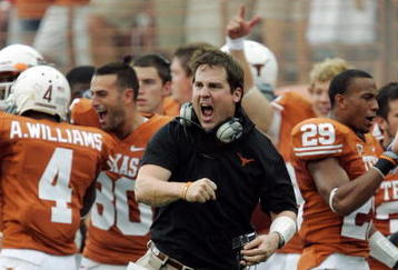 AUSTIN, TX - SEPTEMBER 5:  Defensive coordinator Will Muschamp of the Texas Longhorns gets pumped up after a turnover by the Louisiana Monroe Warhawks in the first quarter on September 5, 2009 at Darrell K Royal-Texas Memorial Stadium in Austin, Texas.  (Photo by Brian Bahr/Getty Images)