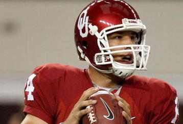 ARLINGTON, TX - SEPTEMBER 05:  Quarterback Sam Bradford #14 of the Oklahoma Sooners drops back to pass against the Brigham Young Cougars at Cowboys Stadium on September 5, 2009 in Arlington, Texas.  (Photo by Ronald Martinez/Getty Images)