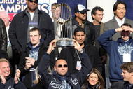 NEW YORK - NOVEMBER 06:  Captain Derek Jeter #2 of the New York Yankees celebrates with the championship trophy during the New York Yankees World Series Victory Celebration at City Hall on November 6, 2009 in New York, New York.  (Photo by Jim McIsaac/Getty Images)