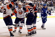 TORONTO - NOVEMBER 23:  The New York Islanders celebrate OT winning goal by Josh Bailey during game action against the Toronto Maple Leafs November 23, 2009 at the Air Canada Centre in Toronto, Ontario, Canada. (Photo by Abelimages/Getty Images)