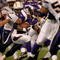 MINNEAPOLIS, MN - NOVEMBER 04:  Adrian Peterson #28 of the Minnesota Vikings runs the ball as he set two NFL records against the San Diego Chargers at the Hubert H. Humphrey Metrodome on November 4, 2007 in Minneapolis, Minnesota. Peterson rushed for 296 yards setting the single game rushing record and marks the first time a rookie has rushed for two 200 yard games in the same season. The Vikings defeated the Chargers 35-17.  (Photo by Doug Pensinger/Getty Images)