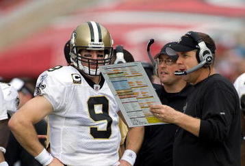 TAMPA, FL - NOVEMBER 22:  Quarterback Drew Brees #9 of the New Orleans Saints and head coach Sean Payton talk along the sidelines during the game against the Tampa Bay Buccaneers at Raymond James Stadium on November 22, 2009 in Tampa, Florida.  (Photo by J. Meric/Getty Images)