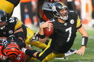 PITTSBURGH - NOVEMBER 15: Ben Roethlisberger #7 of the Pittsburgh Steelers is sacked by Jonathan Fanene #68 of the Cincinnati Bengals at Heinz Field on November 15, 2009 in Pittsburgh, Pennsylvania.  (Photo by Rick Stewart/Getty Images)