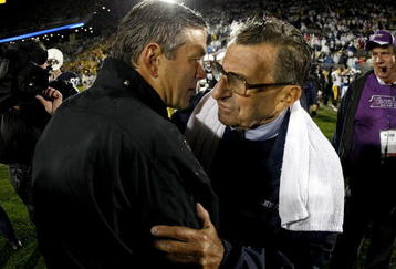 STATE COLLEGE, PA - SEPTEMBER 26:  Head coach Kirk Ferentz of the Iowa Hawkeyes shakes hands with head coach Joe Paterno of the Penn State Nittnay Lions after defeating them 21-10 on September 26, 2009 at Beaver Stadium in State College, Pennsylvania.  (Photo by Gregory Shamus/Getty Images)