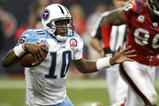 HOUSTON - NOVEMBER 23:  Quarterback Vince Young #10 of the Tennessee Titans runs with the ball against the Houston Texans on November 23, 2009  at Reliant Stadium in Houston, Texas.  (Photo by Stephen Dunn/Getty Images)