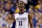 LEXINGTON, KY - NOVEMBER 21:  John Wall #11 of the Kentucky Wildcats celebrates during the game against the Rider Broncs on November 21, 2009 at Rupp Arena in Lexington, Kentucky.  (Photo by Andy Lyons/Getty Images)