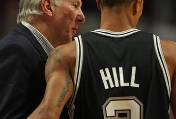 CHICAGO - OCTOBER 29: Head coach Gregg Popovich of the San Antonio Spurs talks with George Hill #3 during a game against the Chicago Bulls at the United Center on October 29, 2009 in Chicago, Illinois. The Bulls defeated the Spurs 92-85. (Photo by Jonathan Daniel/Getty Images)
