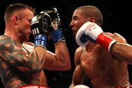 OAKLAND, CA - NOVEMBER 21:  Mikkel Kessler of Denmark (l) is hit by Andre Ward during their WBA Super Middleweight Championship Bout at the Oakland-Alameda County Coliseum on November 21, 2009 in Oakland, California.  (Photo by Jed Jacobsohn/Getty Images)