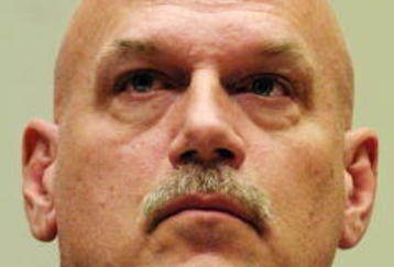 398252 09: Minnesota Governor Jesse Ventura listens to opening statements during a hearing on H.R. 3288, the 'Fairness in Antitrust in National Sports (FANS) Act of 2001' before the House Judiciary Committee December 6, 2001 on Capitol Hill in Washington, DC. With contraction on hold and owners focused on extending Allan 'Bud' Selig's term as commissioner, the House Judiciary Committee held a hearing on baseball's antitrust exemption. (Photo by Alex Wong/Getty Images)