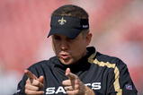 TAMPA, FL - NOVEMBER 22:  Head coach Sean Payton of the New Orleans Saints talks with some players during the game against the Tampa Bay Buccaneers at Raymond James Stadium on November 22, 2009 in Tampa, Florida.  (Photo by J. Meric/Getty Images)