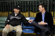 LITTLE FALLS, NJ - NOVEMBER 23:  Baseball Hall of Famer Yogi Berra and four-time Nascar champion Jimmie Johnson chat in the theater at the Yogi Berra Museum and and Learning Center on November 23, 2009 in Little Falls, New Jersey.  (Photo by Jeff Zelevansky/Getty Images for NASCAR)