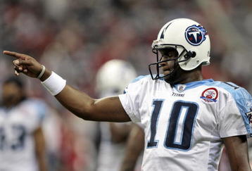 HOUSTON - NOVEMBER 23:  Quarterback Vince Young #10 of the Tennessee Titans warms up prior to taking on the Houston Texans at Reliant Stadium on November 23, 2009 in Houston, Texas.  (Photo by Bob Levey/Getty Images)