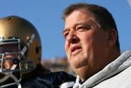 SOUTH BEND, IN - NOVEMBER 21: Head coach Charlie Weis of the Notre Dame Fighting Irish waits to enter the field for a game against the Univeristy of Connecticut Huskies at Notre Dame Stadium on November 21, 2009 in South Bend, Indiana. (Photo by Jonathan Daniel/Getty Images)