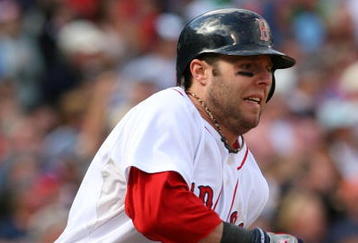 BOSTON - OCTOBER 11:  Dustin Pedroia #15 of the Boston Red Sox rounds the bases after hitting a two-run double in the third inning against the Los Angeles Angels of Anaheim in Game Three of the ALDS during the 2009 MLB Playoffs at Fenway Park on October 11, 2009 in Boston,  Massachusetts. (Photo by Jim Rogash/Getty Images)