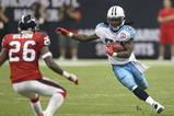 HOUSTON - NOVEMBER 23:  Running Back Chris Johnson #28 of the Tennessee Titans carries the ball against safety Eugene Wilson #26 of the Houston Texans on November 23, 2009  at Reliant Stadium in Houston, Texas.  The Titans won 20-17.  (Photo by Stephen Dunn/Getty Images)