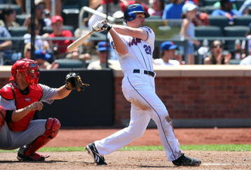 NEW YORK - JULY 12:  Daniel Murphy #28 of the New York Mets hits a RBI single in the fourth inning against the Cincinnati Reds on July 12, 2009 at Citi Field in the Flushing neighborhood of the Queens borough of New York City.  (Photo by Jim McIsaac/Getty Images)