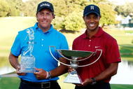ATLANTA - SEPTEMBER 27:  Phil Mickelson (L), winner of THE TOUR Championship presented by Coca-Cola poses alongside Tiger Woods, winner of the 2009 FedExCup at East Lake Golf Club on September 27, 2009 in Atlanta, Georgia.  (Photo by Scott Halleran/Getty Images)