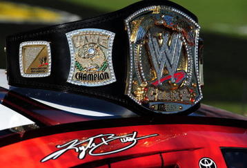 FORT WORTH, TX - NOVEMBER 07:  A replica of the WWE world championship belt rests on top of Kyle Busch's #18 Z-Line Designs/WWE Smackdown Toyota prior to the start of the NASCAR Nationwide Series O'Reilly Challenge at Texas Motor Speedway on November 7, 2009 in Fort Worth, Texas.  (Photo by Robert Laberge/Getty Images for NASCAR)