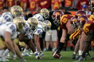 LOS ANGELES, CA - DECEMBER 01:  Bruce Davis #44 of the UCLA Bruins awaits the snap of the ball from the USC Trojans during the college football game at the Los Angeles Memorial Coliseum on December 1, 2007 in Los Angeles, California. The Trojans defeated the Bruins 24-7. (Photo by Jeff Gross/Getty Images)