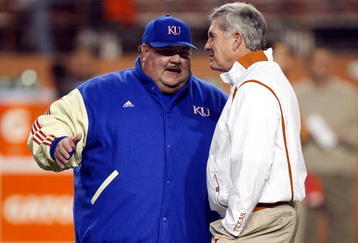 AUSTIN, TX - NOVEMBER 21:  Head coach Mark Mangino of the Kansas Jayhawks talks with Mack Brown of the Texas Longhorns at Darrell K Royal-Texas Memorial Stadium on November 21, 2009 in Austin, Texas.  (Photo by Ronald Martinez/Getty Images)