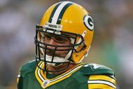 GREEN BAY, WI - SEPTEMBER 13: Aaron Kampman #74 of the Green Bay Packers participates in warm-ups before a game against the Chicago Bears on September 13, 2009 at Lambeau Field in Green Bay, Wisconsin. The Packers defeated the Bears 21-15. (Photo by Jonathan Daniel/Getty Images)